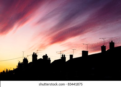 A Fantastic Sunset Lights Up The Clouds Above An Urban Street In Surrey, UK.