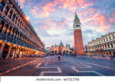 Fantastic sunset on San Marco square with Campanile and Saint Mark's Basilica. Colorful evening cityscape of Venice, Italy, Europe. Traveling concept background. Artistic style post processed photo.
				
				