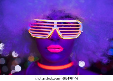 fantastic video of sexy cyber raver woman filmed in fluorescent clothing under UV black light
