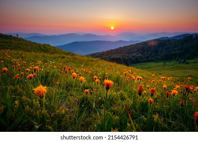 Fantastic view of the sunset over the mountain ranges. Location place Carpathian mountains, Ukraine, Europe. Photo wallpaper. Image of an magical sunset. Summer vacation. Discover the beauty of earth. - Shutterstock ID 2154426791