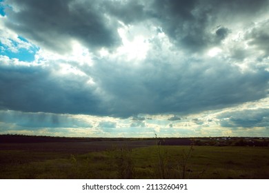 Fantastically Beautiful Cloudy Sky Over The Ukrainian Plain. Landscape Of The Ukrainian Plane.