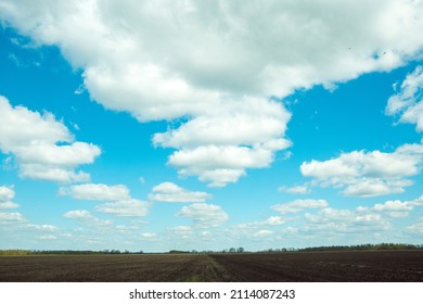 Fantastically Beautiful Cloudy Sky Over The Ukrainian Plain. Landscape Of The Ukrainian Plane.