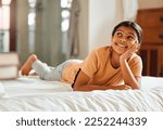 Fantasy, bed and black girl thinking, ideas and relax on weekend, happiness and summer break. African American female child, young lady or daydreaming, imagination and thought with wonder and bedroom