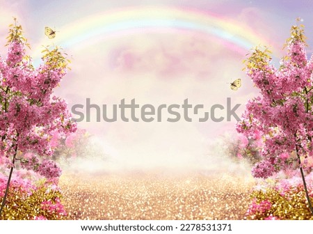 Fantasy fairy tale forest with blooming pink apple tree garden and rainbow in sky, enchanted road path with luminous solar reflection sparkles and flying butterflies, nature landscape background.