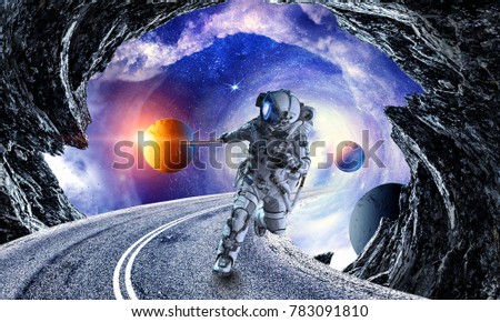 Fantasy image with spaceman catch planet. Mixed media