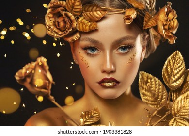 Fantasy Portrait Closeup Woman With Golden Skin, Lips, Body. Girl In Glamour Wreath Gold Roses, Accessories Jewellery, Jewelry. Beautiful Face, Steel Glitter Makeup. Elf Fairy Princess. Fashion Model