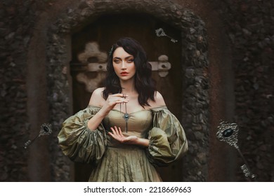 Fantasy portrait woman princess keeps secret holds old key to all doors in hands. Background old wall, wooden door. Medieval Girl Vintage Golden Ancient Style Dress. keys fall hovering floating in air - Shutterstock ID 2218669663