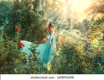 Fantasy princess enjoys summer nature. Vintage long dress flies fluttering in wind. Woman smile happy face. Spirituality divine light sun shine freedom concept, perfume aroma flowers natural cosmetics