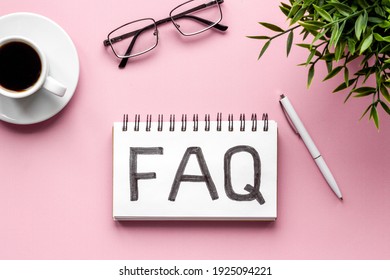 FAQ - fequently asked question - on table ofiice table. Top view
