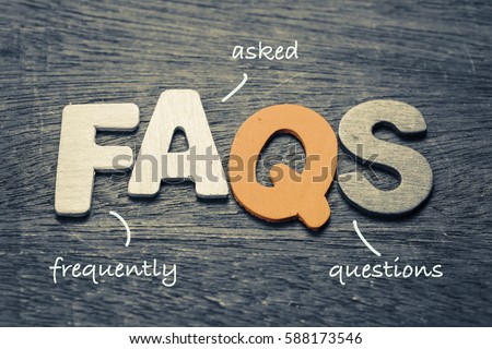 FAQs ( frequently asked questions ) wood letters on wood background