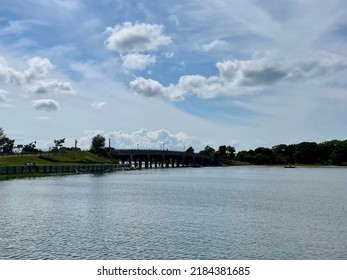 A Far Shot Of The Jordan Haerter Veterans Memorial Bridge Leading To The Town Of Sag Harbor.