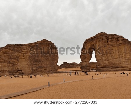 far view of massive rock structures in saudi arabia called elephant rock with desert environment