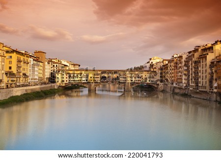 Far view at sunset of Ponte Vecchio in Florence, Italy.