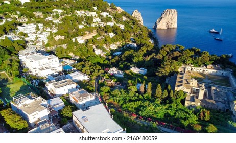 Faraglioni From Capri Town In Capri, Italy. Aerial View From Drone