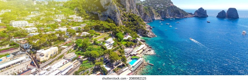 Faraglioni From Marina Piccola Beach In Capri, Italy. Aerial View From Drone