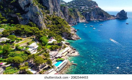 Faraglioni From Marina Piccola Beach In Capri, Italy. Aerial View From Drone