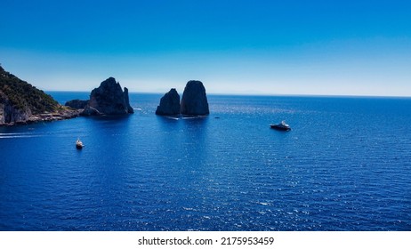 Faraglioni From Marina Piccola Beach In Capri, Italy. Aerial View From Drone