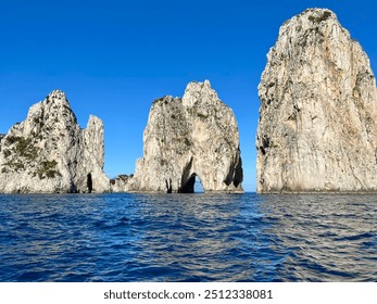 Faraglioni rock formations in Capri, Italy - Powered by Shutterstock