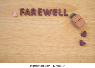 Farewell Text With Carry-on Bag On Wooden Board - Background - Concept 