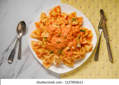 Farfalle Bow Tie Pasta In Creamy Vodka Tomato Sauce With Grilled Chicken And Green Peas