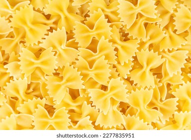 Farfalle spaghetti pattern, food background. Raw pasta, ingredient for cook, traditonal italian cuisine. Wallpaper, banner, header, backdrop for restaurant menu - Powered by Shutterstock