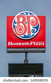 FARGO, ND/USA - JUNE 28, 2019: Boston's The Gourmet Pizza Restaurant And Sports Bar Exterior And Trademark Logo.
