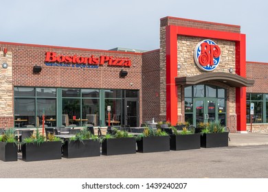 FARGO, ND/USA - JUNE 28, 2019: Boston's The Gourmet Pizza Restaurant And Sports Bar Exterior And Trademark Logo.
