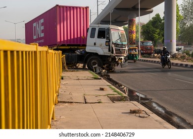 Faridabad, Haryana, India- April 9 2022: truck trailer met accident break the roadside safety barriers, 