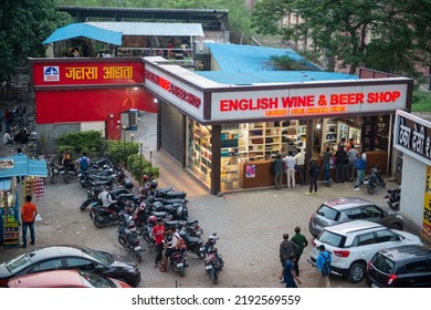 Faridabad, Haryana, India- May 9 2022: People Buying Liquor From Private Wine Shop In Haryana During Evening.