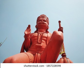 Faridabad, Haryana / India - November, 17, 2020 : Awesome Statue Of Indian God Bajrangbali As Bal Hanuman In Sitting Posture, India