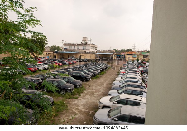 Faridabad, haryana, India-23 August 2019: Jeep\
Compass Facelift SUV cars parked in large compound at faridabad, \
dealer car warehouse\
house.