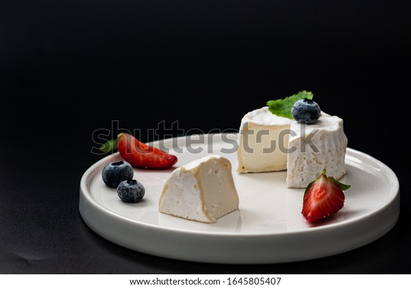 Farm Chaource white cheese with berries - soft\
french cow milk cheese