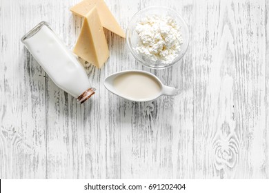 Farm Dairy Products. Milk, Cottage, Cheese On Light Wooden Background Top View Copyspace