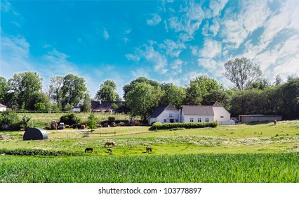 Farm House In Denmark, With Horses And Machines