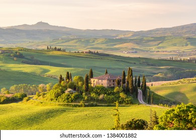 Farm House On A Hill In Tuscany Landscape