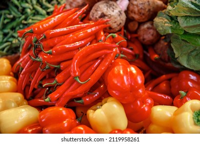 Farm Market Products Concept. Red And Yellow Sweet Paprika Peppers On Bazaar Counter In Egypt.