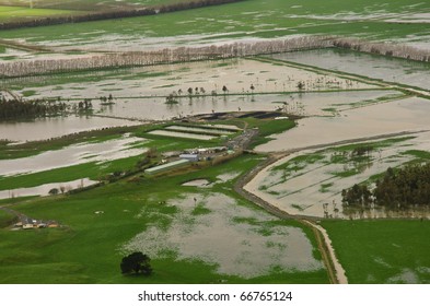 Farm paddocks partially underwater after massive flooding