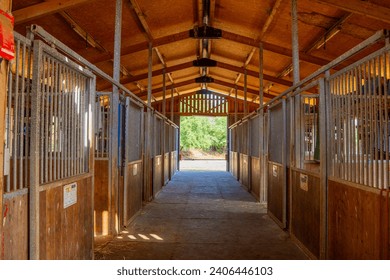 Farm stable or barn interior with sand floor, - Powered by Shutterstock