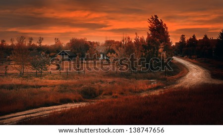 Farm in sunset with dirty road. Oil painting style photo.