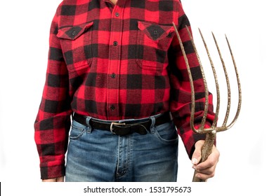 A Farm Worker In A Red And Black Plaid Shirt Holds A Pitch Fork Isolated On White