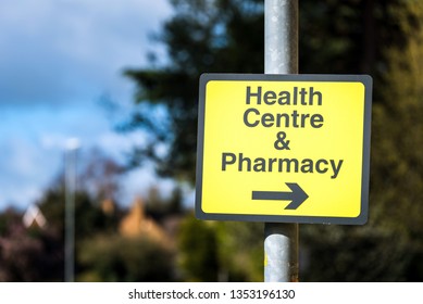 Farmacy Health Centre Directional Road Sign On Road In Uk