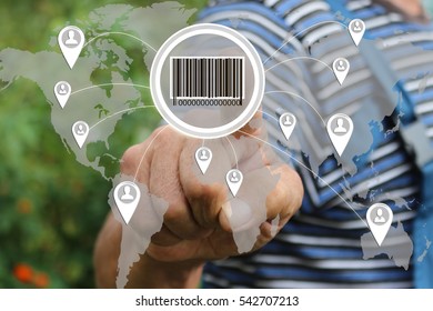 Farmer businessman  clicks barcode product network icon on the touch screen the web network .  Tanned hands, male hands of an elderly person . 