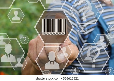 Farmer businessman  clicks barcode product network icon on the touch screen the web network .Tanned hands, male hands of an elderly person.