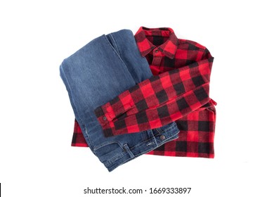 Farmer Fashion; A Pair Of Denim Blue Jeans And A Red Plaid Work Shirt Isolated On White