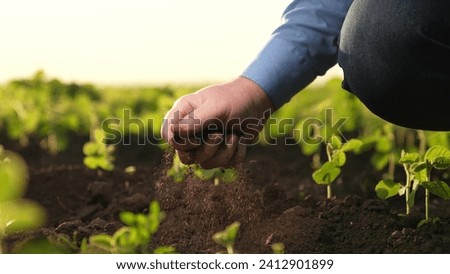 farmer holds soil field hand. Agriculture. Agriculture plays key role maintaining ecosystem preserving biodiversity. Farmers use various farming methods, such fertilization, tillage, plant care