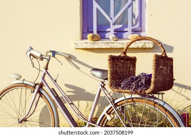 Farmer House And Bicycle Near Lavender Fields Near Valensole In Provence, France. With Bike, Lavender Bouquet In Basket With Typical Provencal Style