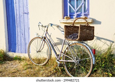 Farmer House And Bicycle Near Lavender Fields Near Valensole In Provence, France. With Bike, Lavender Bouquet In Basket With Typical Provencal Style.