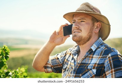 Farmer, man and phone call on vineyard outdoor with talking, communication and discussion of crops growth. Professional, entrepreneur and mobile chat with space, produce control and working on field - Powered by Shutterstock