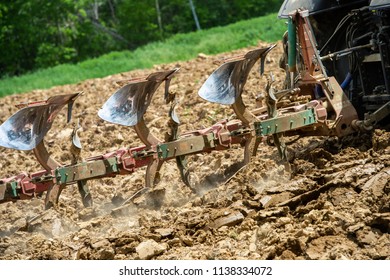 Farmer on tractor plow field, France, Europe