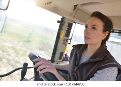 Farmer Woman Driving Tractor